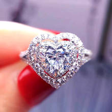 Huitan cor de prata coração anéis de casamento feminino anel de noivado de alta qualidade brilhante cz romântico design da indicação jóias para o sexo feminino 2024 - compre barato