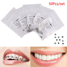 Hebilla de botones linguales para Base redonda, 50 piezas, para ortodoncia Dental 2024 - compra barato