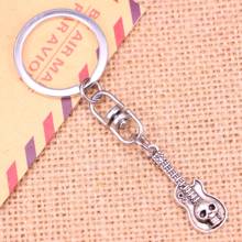 New Fashion Keychain 32x11mm guitar skull Pendants DIY Men Jewelry Car Key Chain Ring Holder Souvenir For Gift 2024 - buy cheap