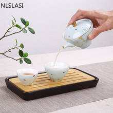 NLSLASI-juego de té chino portátil, de una olla tazas de cerámica, dos tazas de viaje para el hogar y la Oficina, contenedor de Café 2024 - compra barato