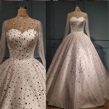 Платье Свадебное блестящее атласное ТРАПЕЦИЕВИДНОЕ с высоким воротником и длинными рукавами 2024 - купить недорого