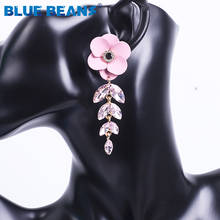 Pendientes de cristal de granos azules para mujer, aretes de flores, joyería de lujo con diamantes de imitación, Pendientes colgantes amarillos 2024 - compra barato