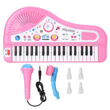 Teclado de Piano Digital de órgano electrónico con 37 teclas, con micrófono, juguetes para niños, juguete de música Stave para desarrollar los modales de los niños 2024 - compra barato