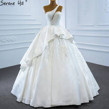 Длинные белые свадебные платья с одним плечом, 2020 атласные, с бисером, свадебные платья принцессы, BHM67207, индивидуальный заказ, Serene Hill 2024 - купить недорого