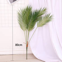 Hojas de palma artificiales grandes para decoración del hogar y boda, palmera de plástico de 80cm, 7 tenedores, plantas tropicales falsas, follaje Monstera de tacto Real 2024 - compra barato