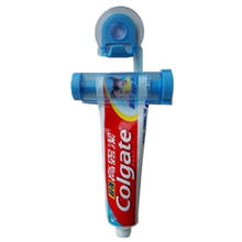 Exprimidor de tubo rodante de plástico, dispensador de pasta de dientes, soporte con ventosa, Manual para baño, jeringa, pistola, envío directo 2024 - compra barato