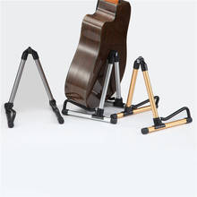 Guitarra elétrica rack suporte dobrável um-frame para guitarra acústica proteger guitarras clássicas baixo ukulele suporte de chão 2024 - compre barato