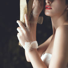 Guantes de novia cortos de marfil para mujer, de dedo completo, cinta transparente, decoración de lazo, longitud de muñeca, disfraz, fiesta de graduación 2024 - compra barato