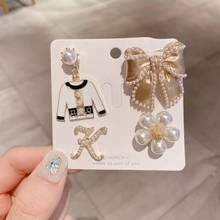 Lujoso broche tridimensional hecho a mano retro perla Camelia número 5, broches de lazo 2024 - compra barato