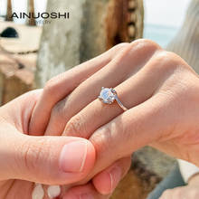 Ainuoshi anel de prata 0,5ct 5mm corte redondo vvs1 d moissanite s925 anéis de diamante aprovados anel de movimento torcido presente para namorada 2024 - compre barato