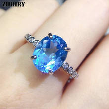 Женское кольцо с натуральным голубым топазом из серебра 925 пробы 2024 - купить недорого