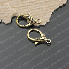 Colgante de aleación con broche de langosta grande, color dorado antiguo, 30x15mm, 10 Uds. (JM2846) 2024 - compra barato