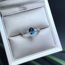 Женское кольцо из серебра 925 пробы, с голубым топазом 2024 - купить недорого