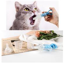 Pet Cat Dog Medicine Dispenser Solid Liquid Medicine Needle Feeding Stick Capsule Pusher Cat Feeder Syringe Tool 2024 - compra barato