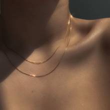 Новые дизайнерские минималистичные тонкие змея цепи позолоченное ожерелье для женщин ниши и цепочкой колье ожерелья ювелирные изделия аксессуары 2024 - купить недорого