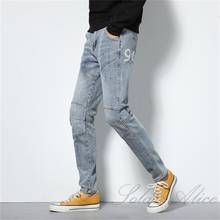 Frete grátis 2020 outono/inverno novo high-end pequeno pés jeans mid-rise marca juventude calças casuais finas 2024 - compre barato