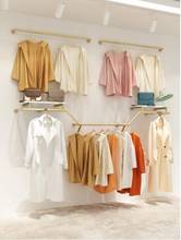 Clothing store display rack wall hanging women's clothing store display rack gold clothes hanger 2024 - buy cheap