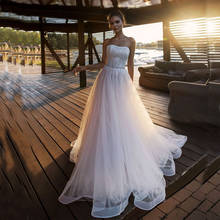 Luxury 2020 Strapless Sequined Crystal Sashes A-line Wedding Dress Tulle Sweep Train Bride Dress Women Gowns robe de mariee 2024 - buy cheap