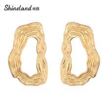 Shineland 2020 Новое поступление матовые металлические золотые геометрические неправильные пустотелые серьги гвоздики для женщин мужчин в стиле панк 2024 - купить недорого
