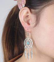 Pendientes de borla de pluma de cadena de estilo étnico para mujer, aretes colgantes de alas de Estilo bohemio, aretes colgantes de alas, regalo para mujer 2020 2024 - compra barato