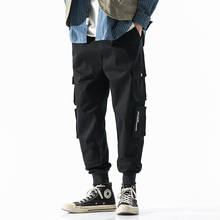 Calça cargo masculina de vários bolsos, calça de moletom hip hop para homens, nova calça de lazer, harem com tamanhos grandes 2020 2024 - compre barato