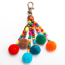 LLavero de joyería hecho a mano con pompón de perlas de madera, llavero con borlas, borla de manualidades, joyería de moda QH6005 2024 - compra barato