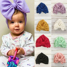 Niño niños niña bebé invierno cálido moño turbante sombrero de algodón Beanie Cap 2024 - compra barato