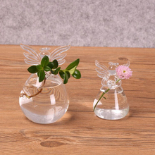 Macetero de cristal con forma de Ángel para flores, florero transparente colgante para decoración de hogar, oficina y boda, 1 Uds. 2024 - compra barato