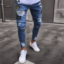 Calças de brim masculinas stretchy rasgado magro motociclista destruído gravado fino ajuste calças de brim dos desenhos animados tag fshion streetwear jeans 2024 - compre barato