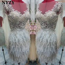 Nyzy c107 vestido de penas elegante vestido de baile curto 2019 ilusão manga longa frisado prata renda festa robe vestidos de coctel 2024 - compre barato