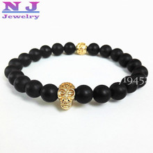 Joyería de Yoga de nuevo diseño para hombres, venta al por mayor, de alta calidad, 8mm, piedra negro mate, Cuenta de piedra con pulseras del calavera de oro de 24K 2024 - compra barato