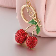 El adorno de diamantes de imitación de aleación más agradable cherry lYSK074 encantador colgante de bolsa o monedero teclas Rojas anillo llavero de coche 2023 - compra barato