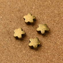 Abalorios vintage de estrella antigua de bronce, Cuentas pequeñas de 1mm de diámetro, 200 Uds., venta al por mayor 2024 - compra barato