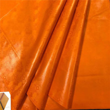 Австрийское качество Bazin богатая ткань, похожая на хлопок, качественная жаккардовая парчовая ткань из 100% хлопка духи шадда оранжевого цвета 2024 - купить недорого