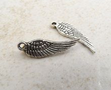 50 Uds. Colgante de alas de Angel antiguo tibetano plata tono 2 Mini Ángel alas colgantes encanto 17x5mm 2024 - compra barato
