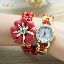 Shsby novo relógio feminino de alta qualidade com pulseira de pérola em formato de estrela do mar e flor, relógios de pulso de quartzo para mulheres, relógios elegantes com strass 2024 - compre barato