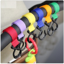 Accesorios de plástico Multicolor para bebé, colgador de 2 ganchos para silla de paseo, Correa colgante para coche, Color aleatorio, alta calidad 2024 - compra barato