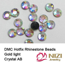 DMC hierro en Hotfix Cristal Diamantes de imitación oro cristal claro AB Strass piedras para accesorios de prendas de vestir diamantes redondos de vidrio plano 2024 - compra barato