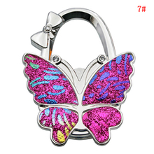 Cartera de Metal portátil con diseño de mariposa, anzuelos de aleación, bolso de mano, soporte de gancho de suspensión plegable único, 1 Uds. 2024 - compra barato