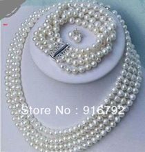 Wholesale free shipping >>>>>PERFECT4rowAAA +6-7 mm Tahitian white pearl necklace + bracelet + earrings 2024 - buy cheap