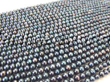 Venta al por mayor Cuentas de Perlas de agua dulce redondo negro suelto, 6-7mm 2024 - compra barato