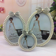 European Style Alloy Picture Frame 3inch 6inch 7inch Oval Round Shape Photo Frame with Cute Bow Decorated Pearl Frame Home Decor 2024 - buy cheap