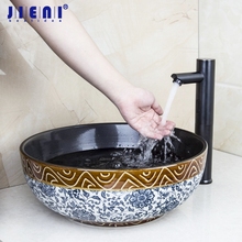 JIENI-grifo de cerámica con Sensor para lavabo de baño, conjunto combinado de fregadero, mezclador de fregadero, color negro 2024 - compra barato