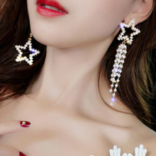 Pendientes coreanos de perla simulada asimétrica para mujer, joyería de moda, aretes largos de borla de estrellas de cinco puntas para mujer, venta al por mayor 2024 - compra barato