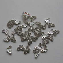 Abalorios de Metal para decoración de uñas, adornos de mariposas de plata con diamantes de imitación de cristal de lujo, MD-304, 10 Uds. 2024 - compra barato