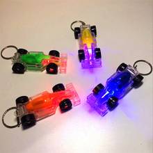 HBB 1 шт. детские мини мигающие игрушки мультяшный автомобиль в форме автомобиля брелок подарок гаджеты фонарик дети светящиеся игрушки случайный цвет 2024 - купить недорого