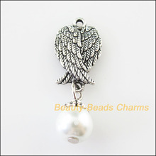 New 16Pcs Tibetan Silver Color Animal Wings White Glass Beads Charms Pendants 11x32mm 2024 - buy cheap