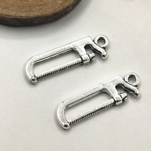 10pcs 25*7mm tools saw Charms Pendants For Jewelry Making Antique Silver  Charm DIY Handmade Craft 2024 - compre barato