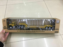 Cat CT660 Day Cab Tractor & XL 120 Low-Profile Hdg Trailer 1:50 DieCast Masters 2024 - buy cheap