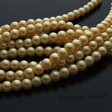 Venta al por mayor de perlas de imitación de cristal de oro de 6mm, perlas de imitación baratas para encontrar envío gratis 2024 - compra barato